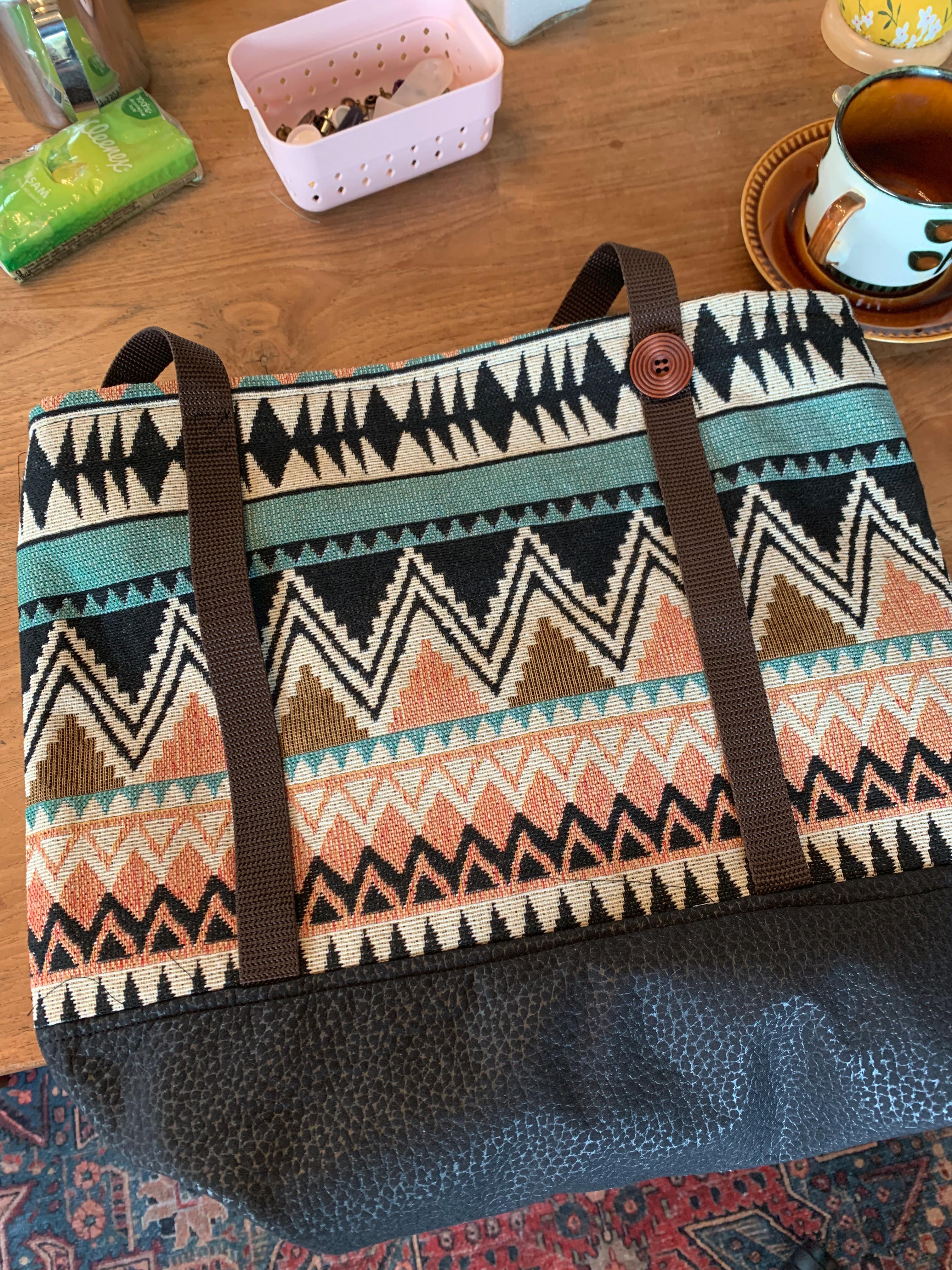 Close-up van tas Naaiatelier Noordbroek workshop.